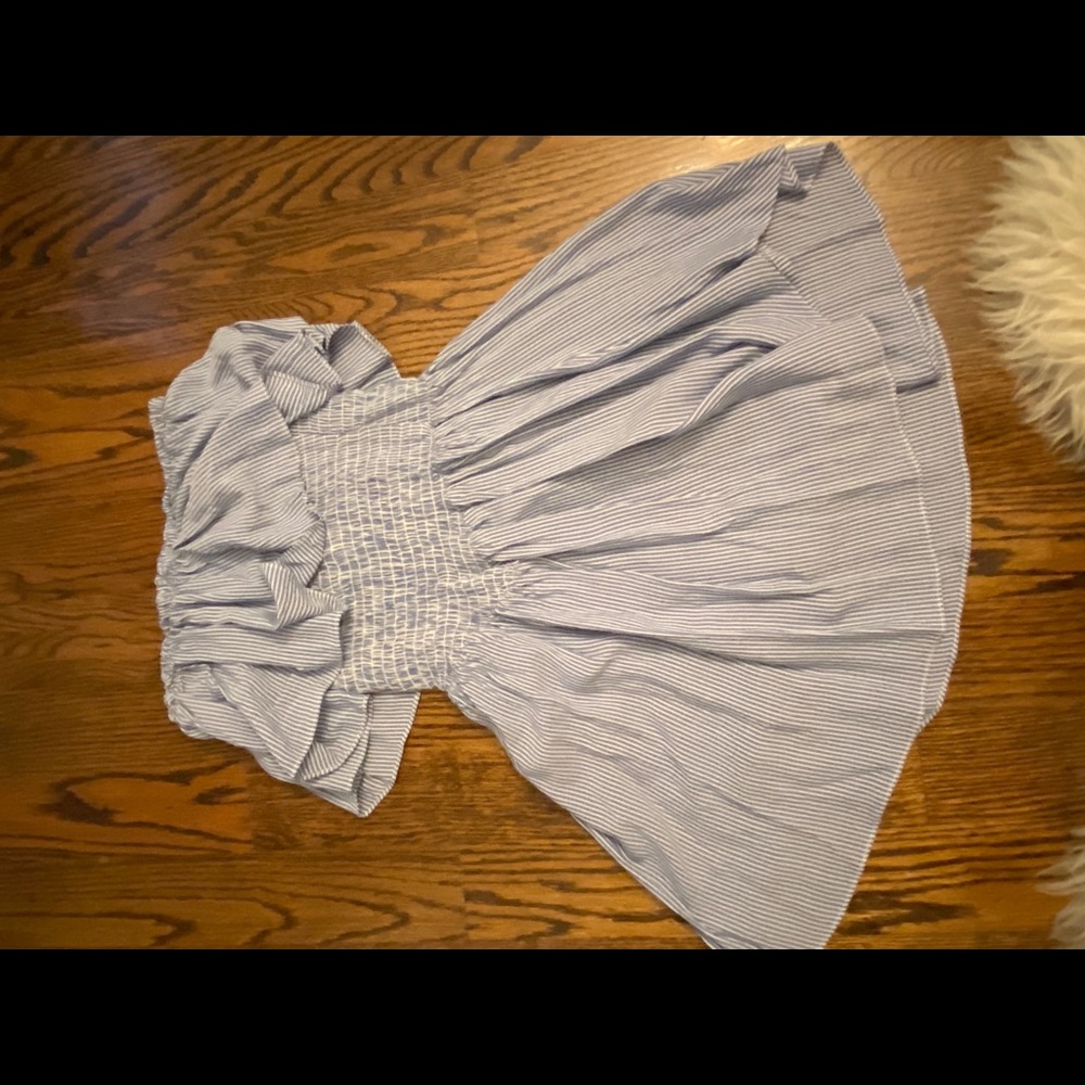 a strapless white and blue romper